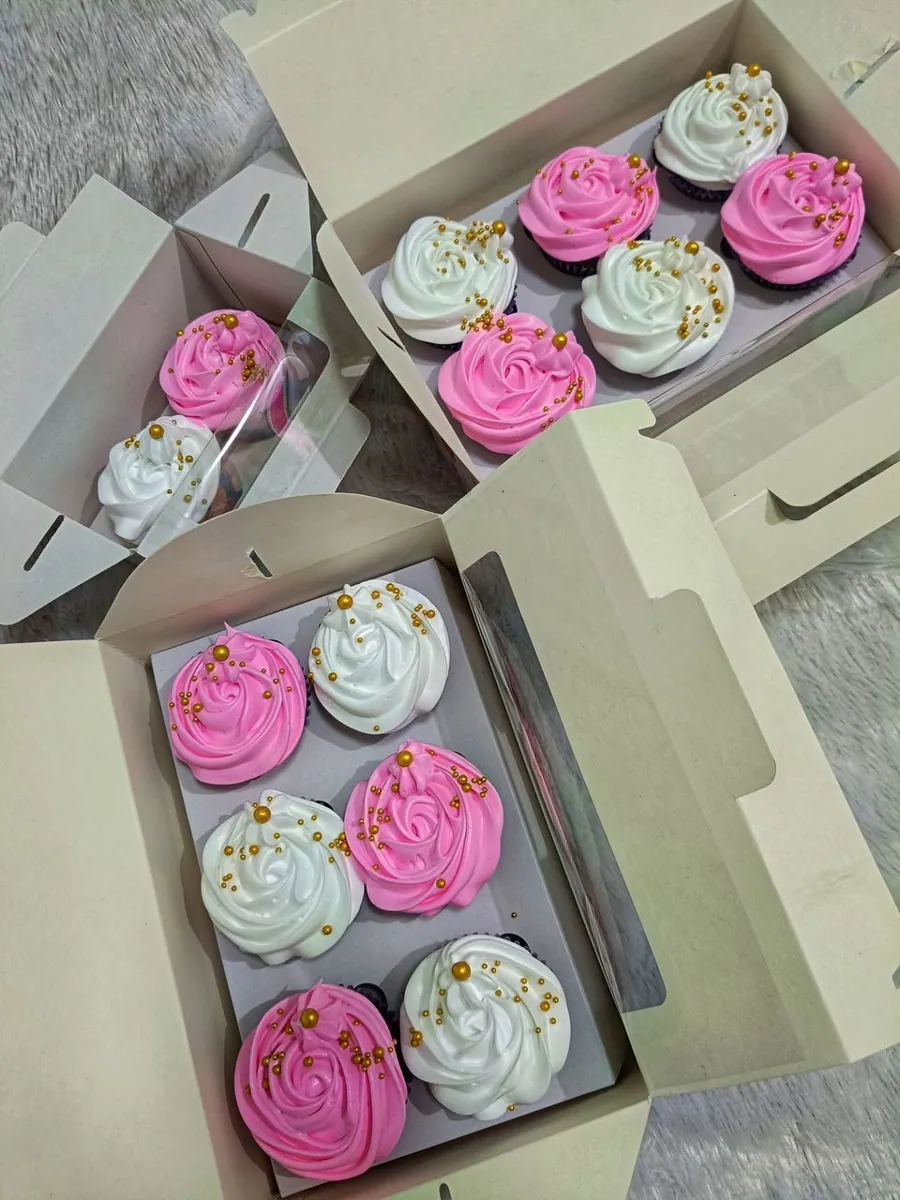 Pink and white cupcakes with gold sprinkles