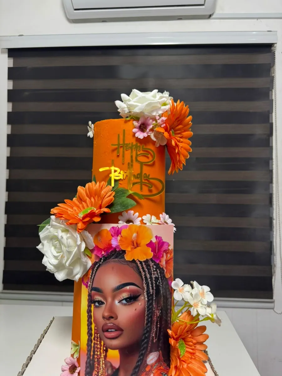 Orange floral celebration cake