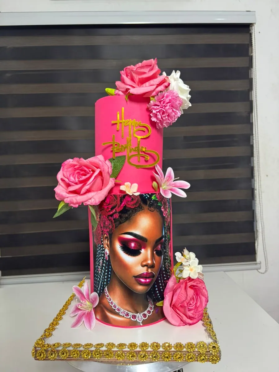 Pink floral birthday cake by Pleasure Cakes Ghana